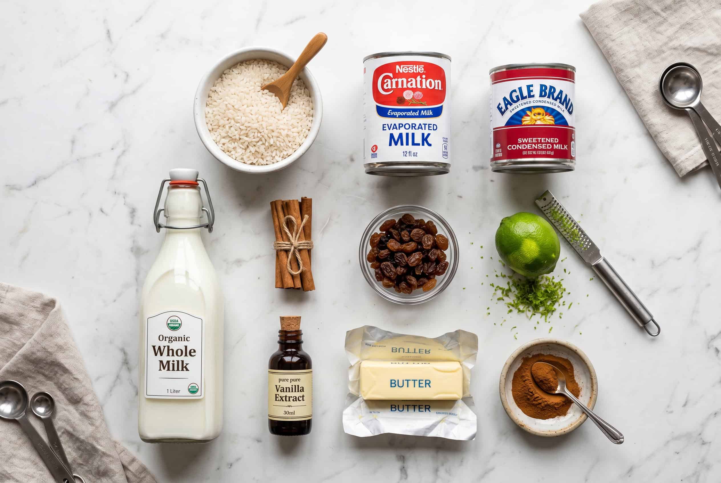 Ingredients for arroz con leche dominicano on white counter