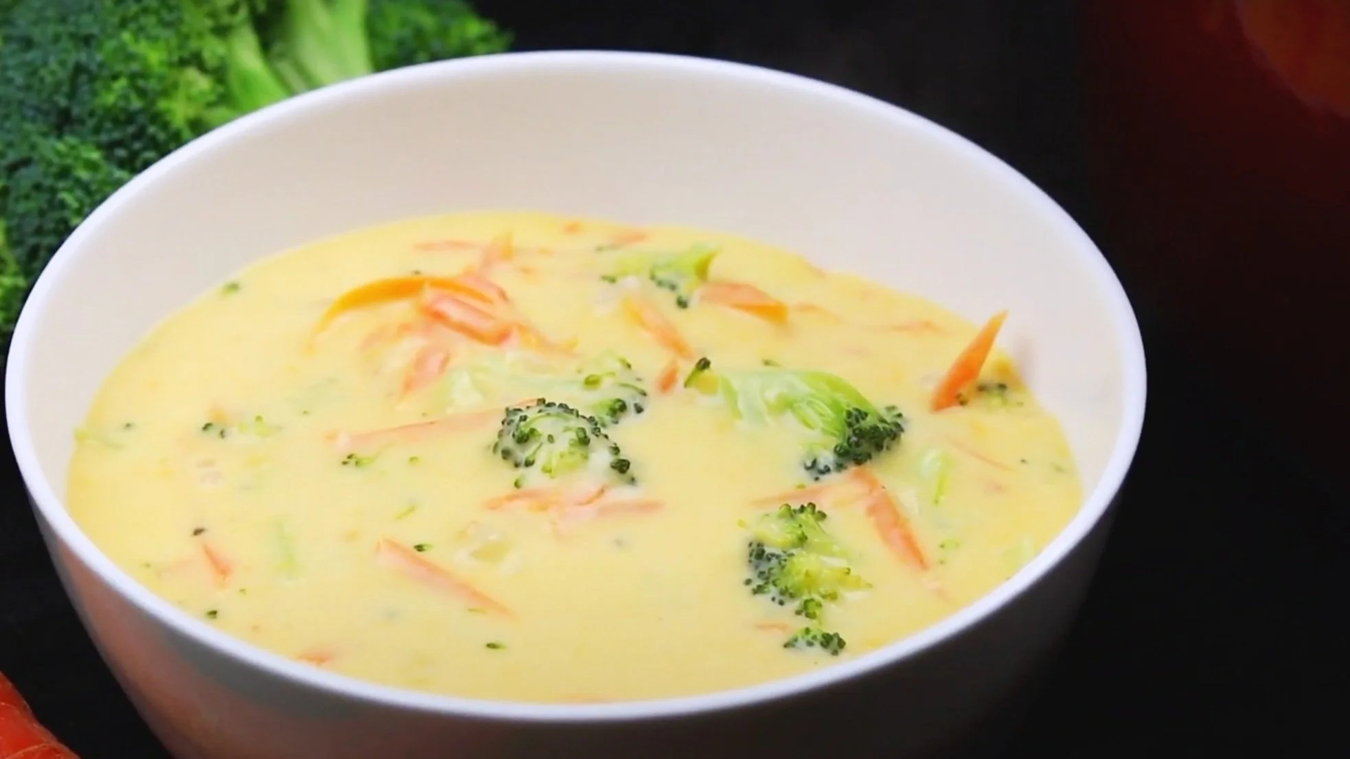 Chopped carrots and onions in skillet