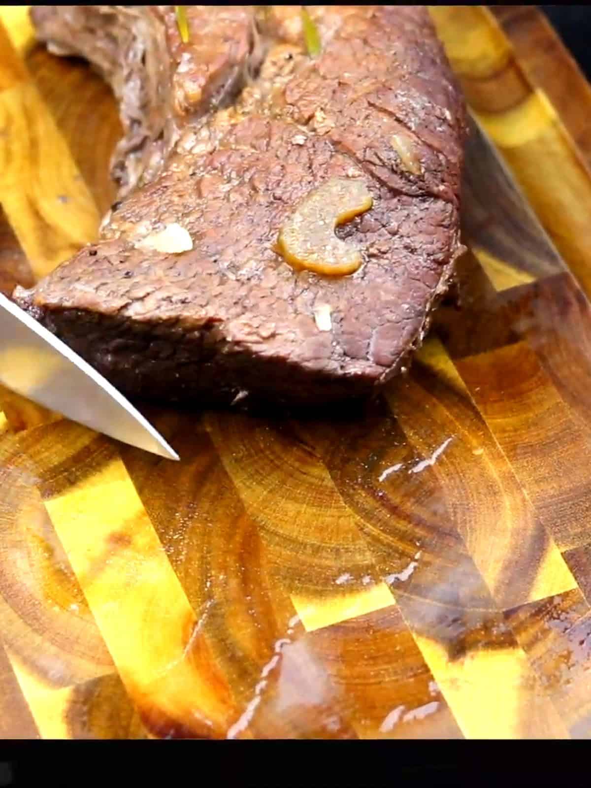 The Most Savory Pot Roast Recipe - finished pot roast with vegetables