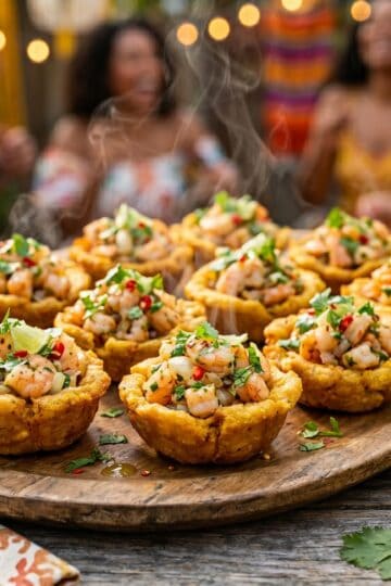 Dominican tostones rellenos cups filled with garlic shrimp and cilantro