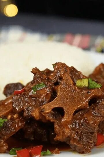 Caribbean Oxtail Stew with white rice and fried plantains